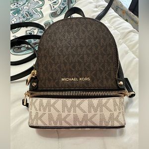 Small Michael Kors backpack purse.